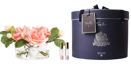 Аромабукет коралловых роз в овальной прозрачной вазе Cote Noire